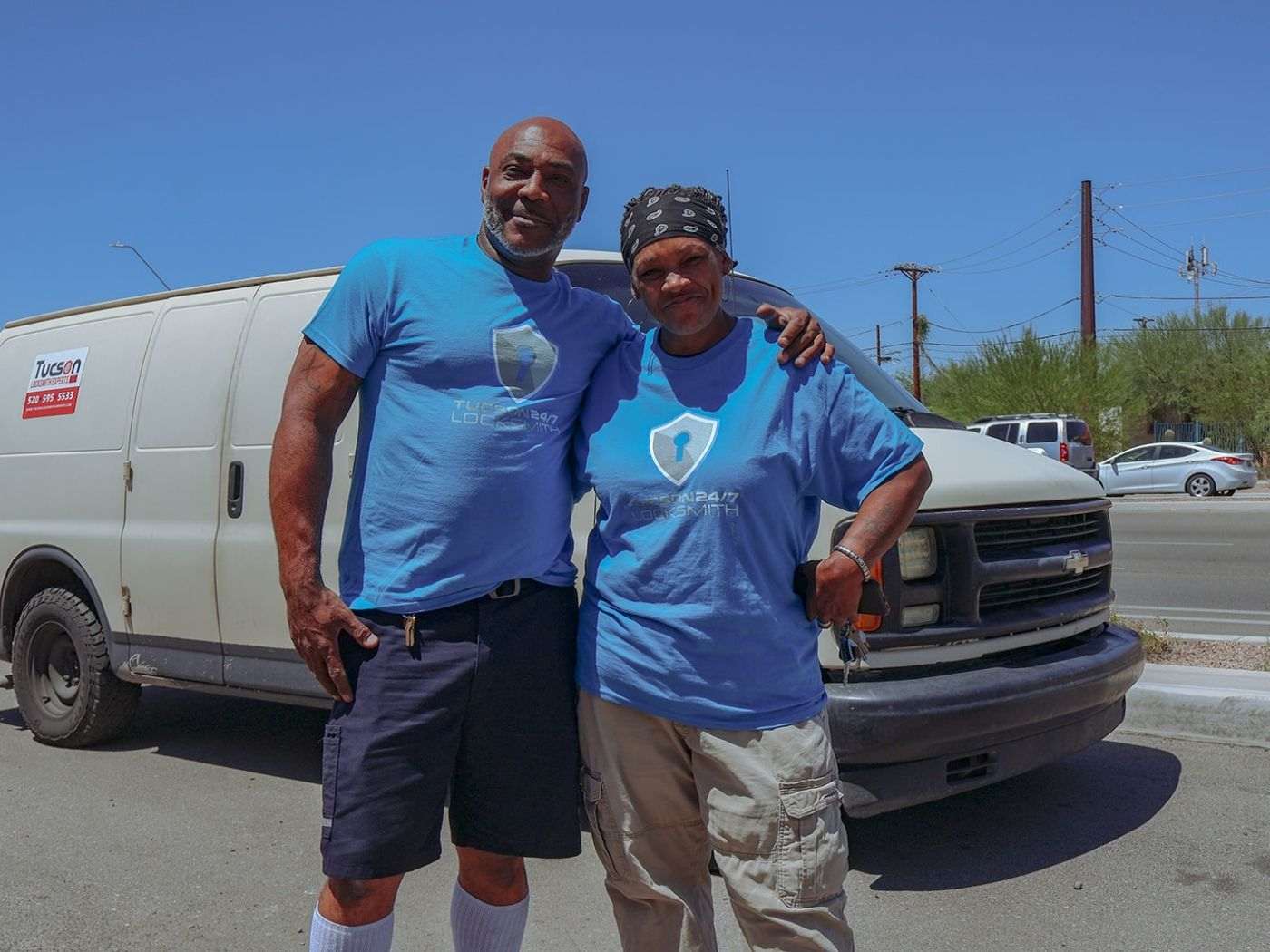 Tucson 24/7 Locksmith technicians next to their mobile service van in Tucson, Arizona